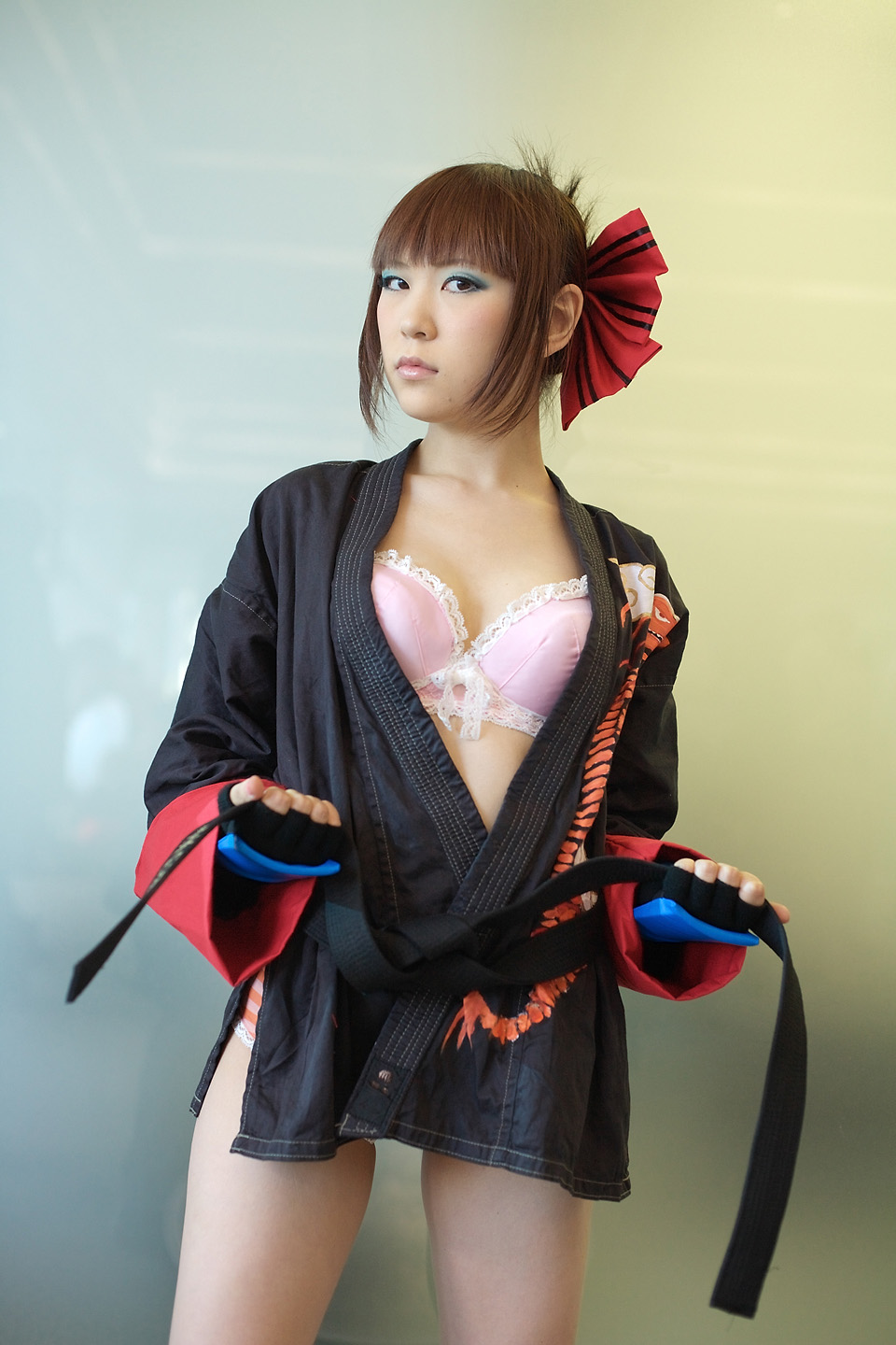 kabi, aihara makoto, rumble roses, striped, highres, photo (medium), bow, bra, cosplay, gloves, hair bow, lingerie, open gi, panties, the black belt demon, underwear