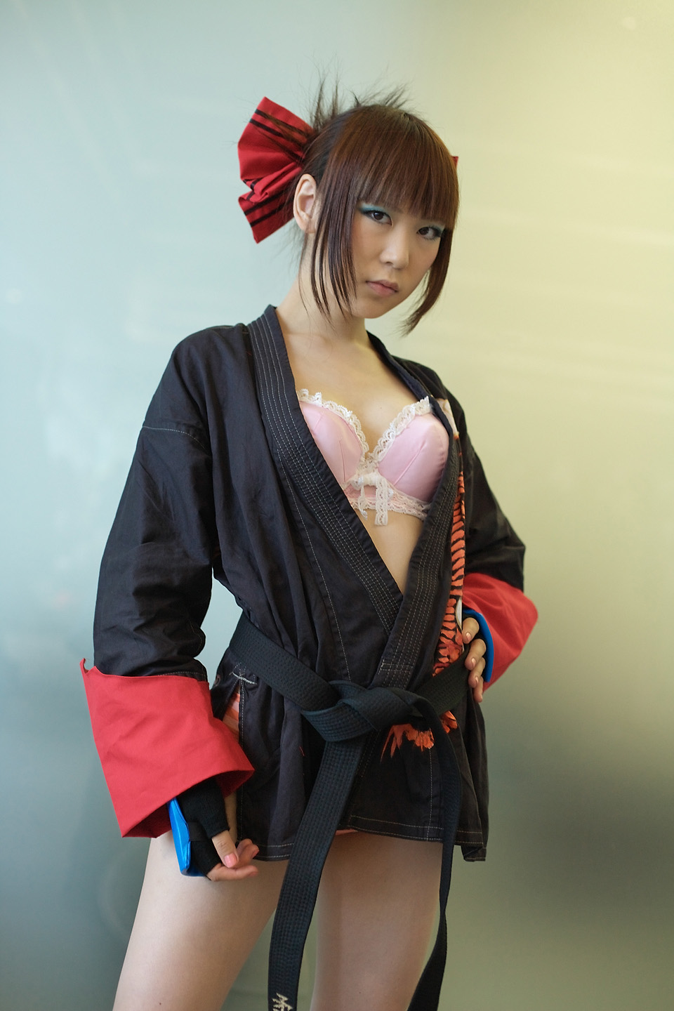 kabi, aihara makoto, rumble roses, striped, highres, photo (medium), bow, bra, cosplay, gloves, hair bow, lingerie, open gi, panties, the black belt demon, underwear
