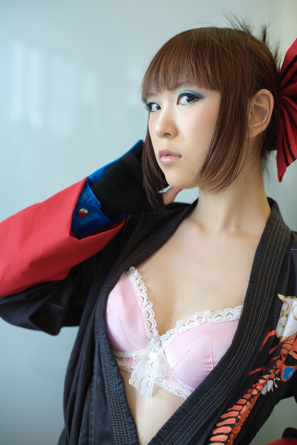 kabi, aihara makoto, rumble roses, striped, highres, photo (medium), bow, bra, cosplay, gloves, hair bow, lingerie, open gi, panties, the black belt demon, underwear