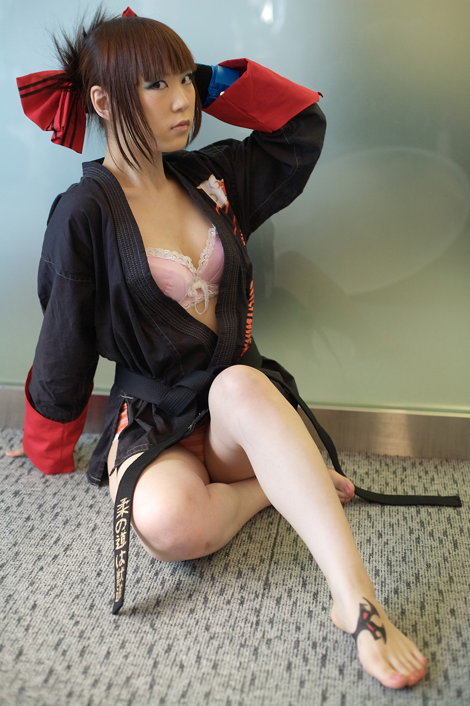 kabi, aihara makoto, rumble roses, highres, photo (medium), barefoot, bow, bra, cosplay, dougi, feet, gloves, hair bow, lingerie, open clothes, open gi, open shirt, panties, shirt, striped clothes, striped panties, the black belt demon, underwear