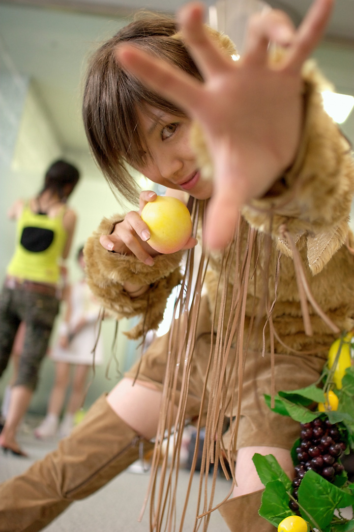 namako, tm revolution, wild rush, fur, photo (medium), 3girls, animal ears, asian, bare shoulders, blurry, brown eyes, brown hair, choker, cosplay, depth of field, dog ears, dutch angle, fake animal ears, food, fringe trim, fruit, grapes, indoors, leaf, leaning forward, looking at viewer, matching hair/eyes, multiple girls, outstretched arm, peach, short hair, smile, solo focus, thighhighs