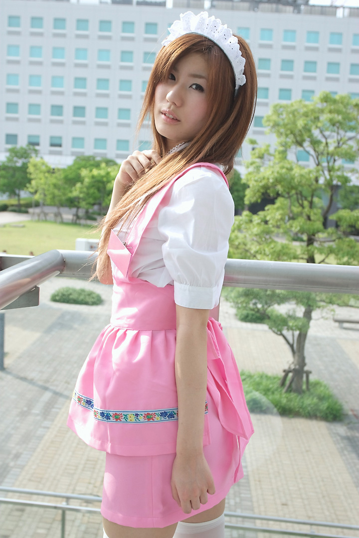 adachi mikki, anna miller, photo (medium), 1girl, apron, asian, brown hair, cosplay, dyed hair, female focus, looking at viewer, outdoors, solo, thighhighs, waitress, waitress uniform, white thighhighs