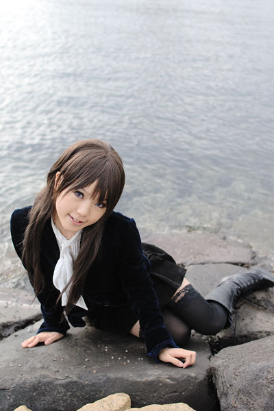 kipi-san, real life, character request, copyright request, cosplay request, photo (medium), 1girl, asian, black thighhighs, boots, brown hair, female focus, long hair, looking at viewer, miniskirt, outdoors, scarf, skirt, solo, thighhighs, velvet jacket, water, zettai ryouiki