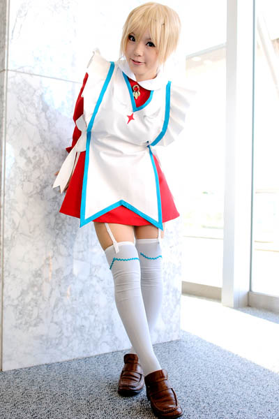 kipi-san, erstin ho, my-otome, photo (medium), 1girl, asian, blonde hair, brown shoes, cosplay, erstin ho (cosplay), female focus, garter straps, indoors, leaning forward, loafers, looking at viewer, school uniform, shoes, short hair, solo, thighhighs, white thighhighs, zettai ryouiki
