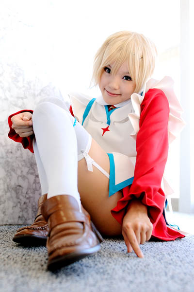 kipi-san, erstin ho, my-otome, photo (medium), 1girl, asian, blonde hair, brown shoes, cosplay, erstin ho (cosplay), female focus, garter straps, indoors, loafers, looking at viewer, on floor, school uniform, shoes, short hair, sitting, solo, thighhighs, white thighhighs, zettai ryouiki