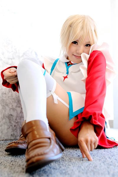 kipi-san, erstin ho, my-otome, photo (medium), 1girl, asian, blonde hair, brown shoes, cosplay, erstin ho (cosplay), female focus, garter straps, indoors, loafers, looking at viewer, on floor, school uniform, shoes, short hair, sitting, solo, thighhighs, white thighhighs, zettai ryouiki