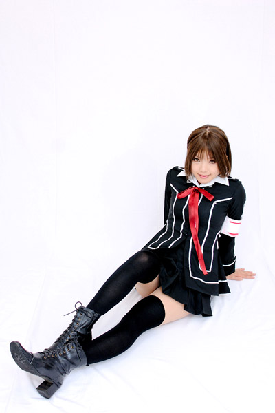 kipi-san, kurosu yuuki, vampire knight, photo (medium), 1girl, armband, asian, boots, brown eyes, brown hair, cosplay, female focus, kurosu yuuki (cosplay), looking at viewer, school uniform, short hair, simple background, solo, thighhighs, white background, zettai ryouiki