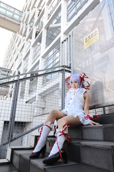 kipi-san, al azif (demonbane), demonbane, photo (medium), 1girl, al azif (cosplay), asian, cosplay, dress, female focus, frills, hair ribbon, looking at viewer, outdoors, purple hair, ribbon, socks, solo, wrist cuffs