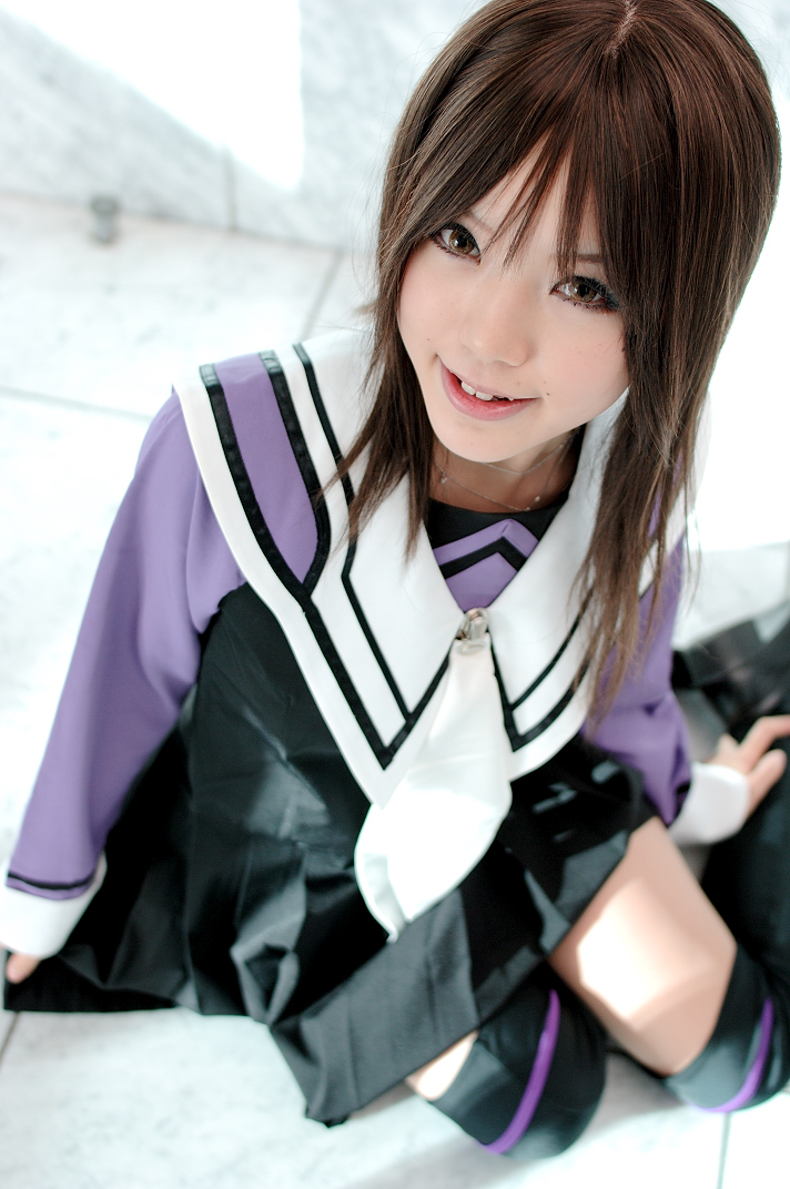 kipi-san, yoshizuki iori, i"s, photo (medium), 1girl, asian, brown eyes, brown hair, cosplay, female focus, looking at viewer, mole, school uniform, serafuku, sitting, solo, thighhighs, yokozuwari, yoshizuki iori (cosplay), zettai ryouiki