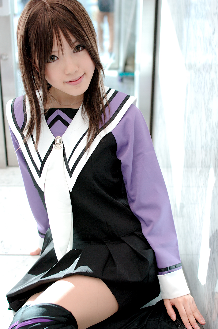 kipi-san, yoshizuki iori, i"s, photo (medium), 1girl, asian, brown eyes, brown hair, cosplay, female focus, indoors, looking at viewer, school uniform, serafuku, sitting, solo, thighhighs, yokozuwari, yoshizuki iori (cosplay), zettai ryouiki