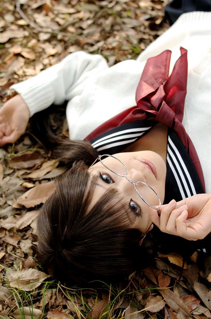 kipi-san, masuda shizuka, final approach, photo (medium), 1girl, asian, blue eyes, breasts, brown hair, color contacts, cosplay, female focus, glasses, leaf, lensless glasses, long hair, looking at viewer, masuda shizuka (cosplay), mole, outdoors, school uniform, serafuku, small breasts, solo, twintails
