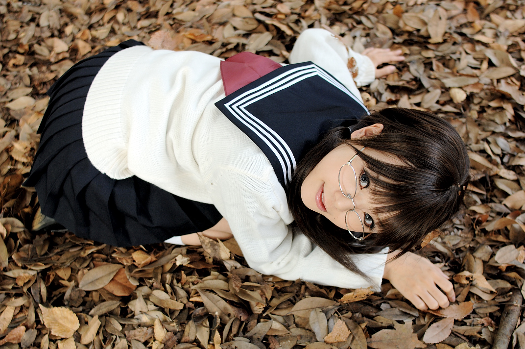 kipi-san, masuda shizuka, final approach, photo (medium), 1girl, asian, breasts, brown hair, color contacts, cosplay, female focus, glasses, leaf, lensless glasses, long hair, looking at viewer, masuda shizuka (cosplay), mole, outdoors, school uniform, serafuku, small breasts, socks, solo, twintails