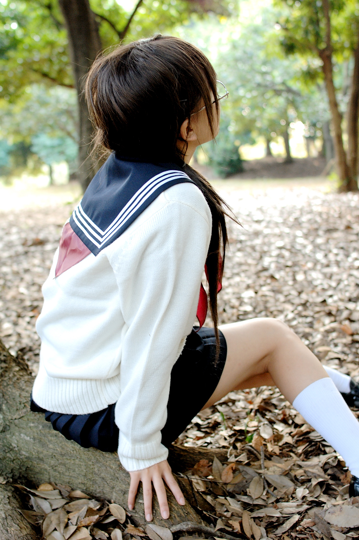 kipi-san, masuda shizuka, final approach, photo (medium), 1girl, asian, breasts, brown hair, cosplay, female focus, glasses, leaf, lensless glasses, long hair, masuda shizuka (cosplay), outdoors, school uniform, serafuku, sitting, small breasts, socks, solo, tree, twintails