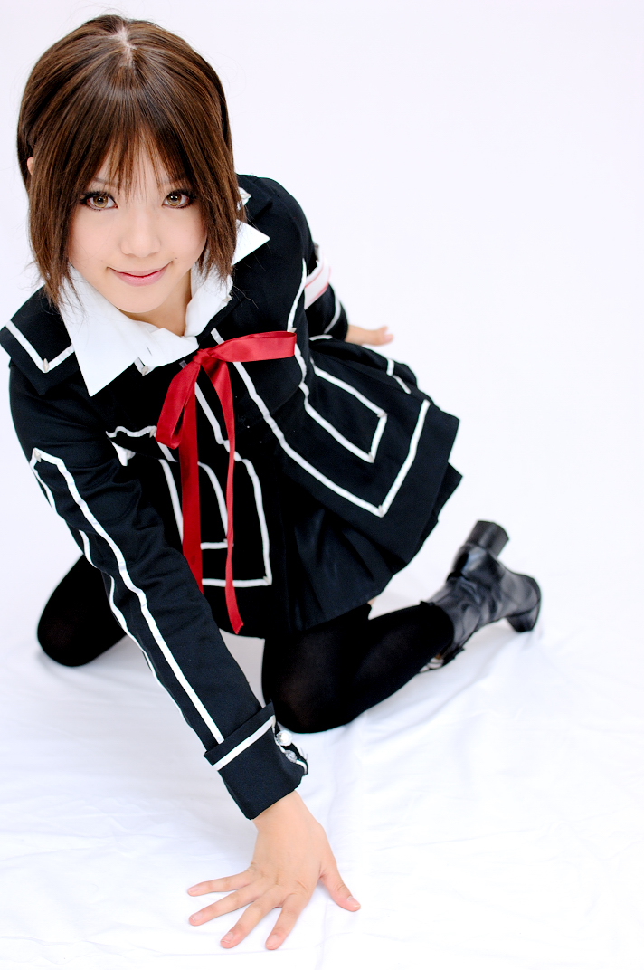 kipi-san, kurosu yuuki, vampire knight, photo (medium), 1girl, armband, asian, boots, brown eyes, brown hair, cosplay, female focus, kurosu yuuki (cosplay), looking at viewer, school uniform, simple background, solo, thighhighs, white background, zettai ryouiki