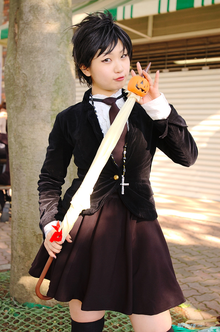 takamura mashiro, road kamelot, d.gray-man, photo (medium), 1girl, asian, black hair, cosplay, cross, cross necklace, female focus, jack-o'-lantern, jewelry, looking at viewer, miniskirt, necklace, necktie, pumpkin, short hair, skirt, skirt set, solo, thighhighs, tree, umbrella, velvet jacket, zettai ryouiki