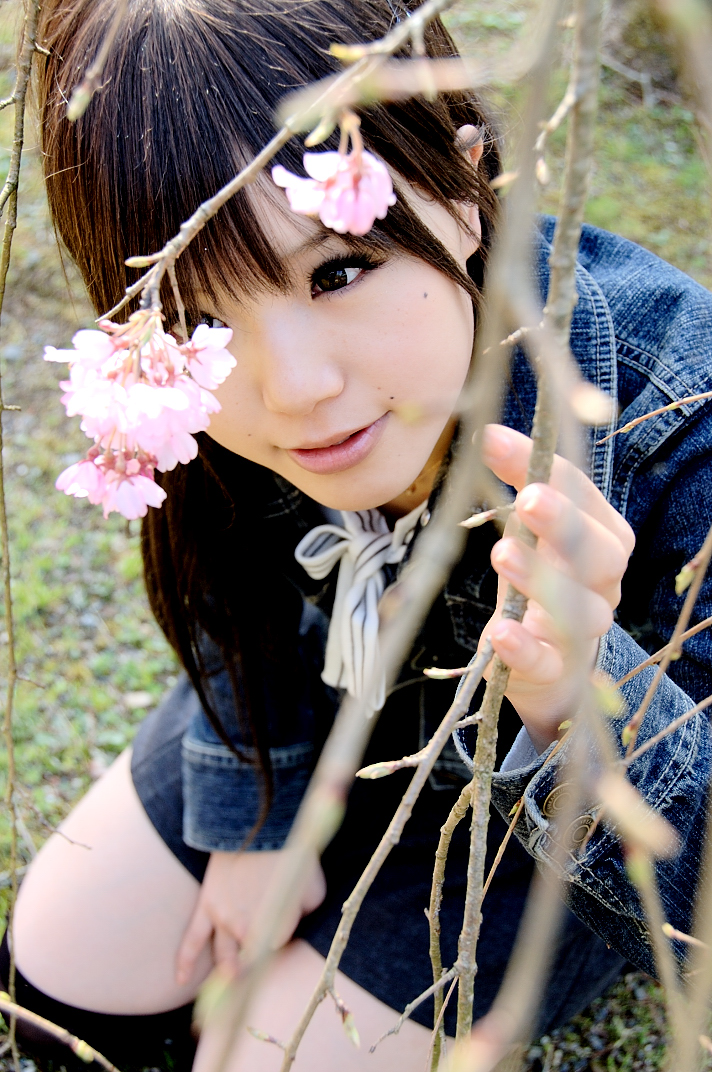 kipi-san, photo (medium), tagme, 1girl, asian, brown eyes, brown hair, cherry blossoms, denim, denim jacket, female focus, jacket, jewelry, miniskirt, mole, necklace, outdoors, pendant, skirt, solo, thighhighs, tree, zettai ryouiki