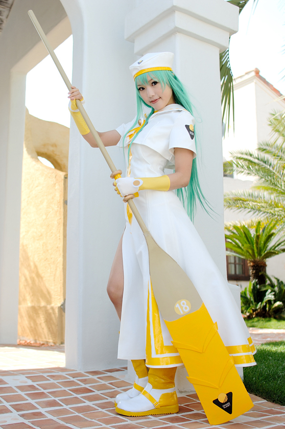 kipi-san, alice carroll, undine, aria (manga), photo (medium), 1girl, alice carroll (cosplay), asian, blue eyes, boots, color contacts, cosplay, female focus, fingerless gloves, gloves, green hair, hat, long hair, looking at viewer, mole, oar, outdoors, palm tree, sailor collar, solo, tree