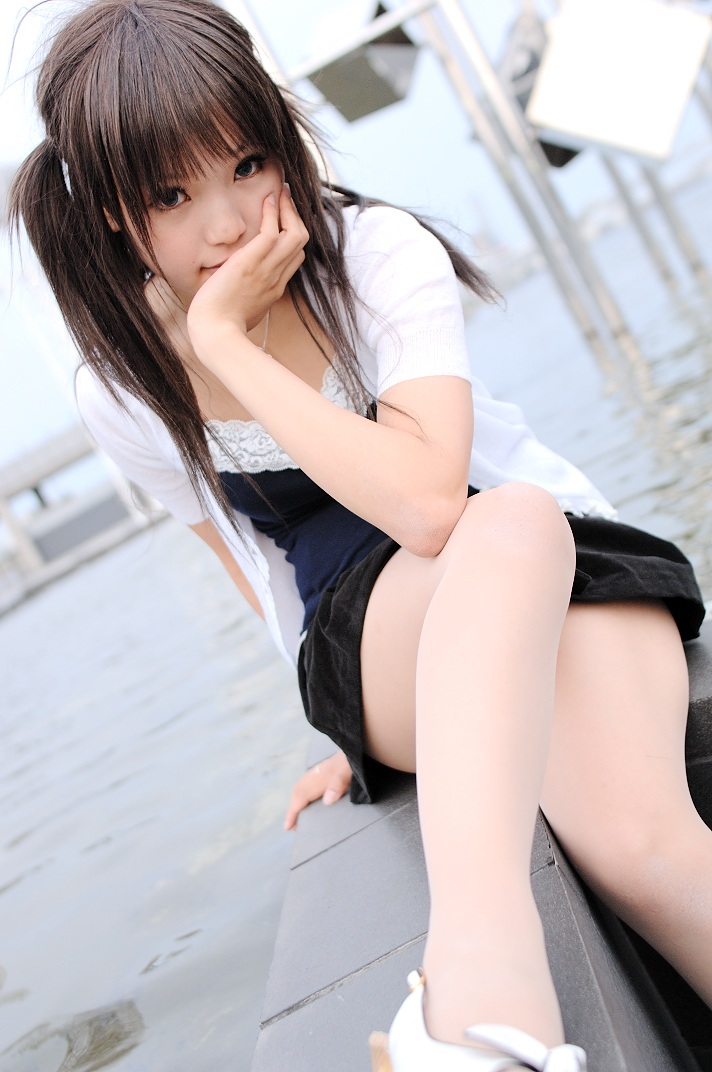 kipi-san, photo (medium), 1girl, arm support, asian, breasts, brown hair, cardigan, dress, dutch angle, female focus, head rest, jewelry, looking at viewer, miniskirt, outdoors, pantyhose, pendant, sitting, skirt, small breasts, solo, twintails