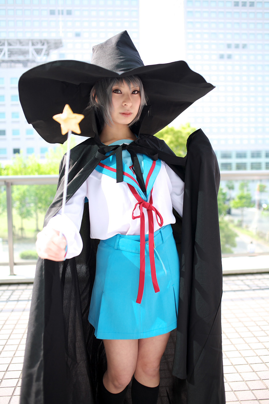 ari (model), nagato yuki, suzumiya haruhi no yuuutsu, highres, photo (medium), cape, cosplay, hat, kneehighs, sailor, school uniform, serafuku, socks, wand, witch hat