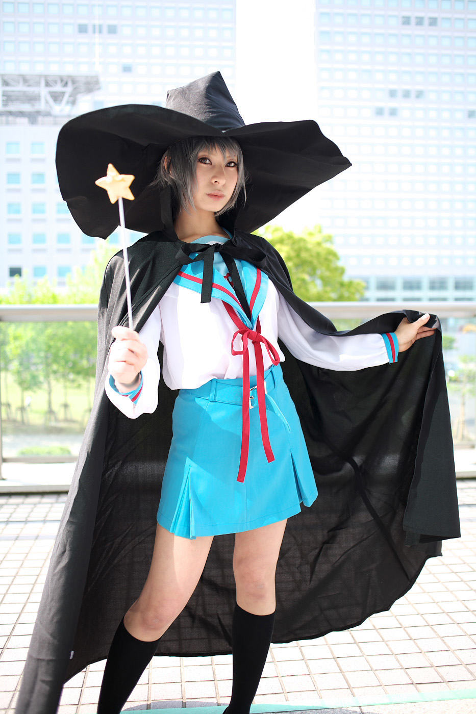 ari (model), nagato yuki, suzumiya haruhi no yuuutsu, highres, photo (medium), cape, cosplay, hat, kneehighs, sailor, school uniform, serafuku, socks, wand, witch hat