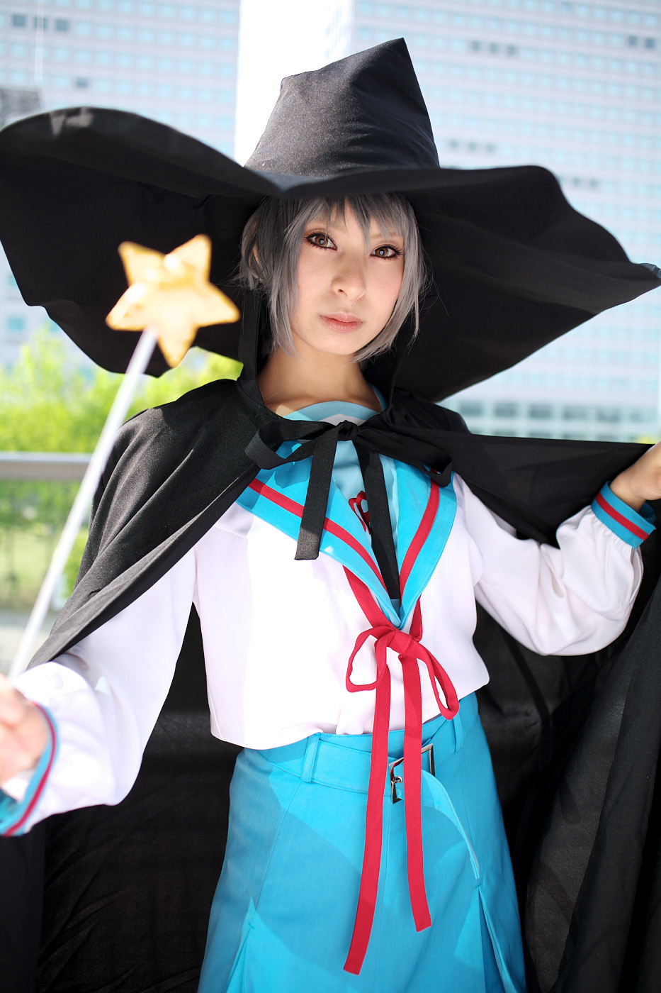 ari (model), nagato yuki, suzumiya haruhi no yuuutsu, highres, photo (medium), cape, cosplay, hat, kneehighs, sailor, school uniform, serafuku, socks, wand, witch hat