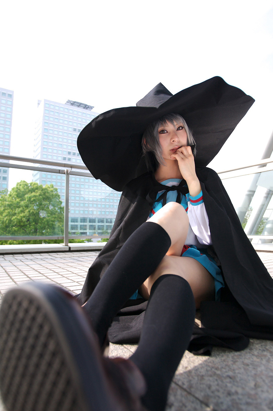 ari (model), nagato yuki, suzumiya haruhi no yuuutsu, highres, photo (medium), cape, cosplay, hat, kneehighs, sailor, school uniform, serafuku, socks, witch hat