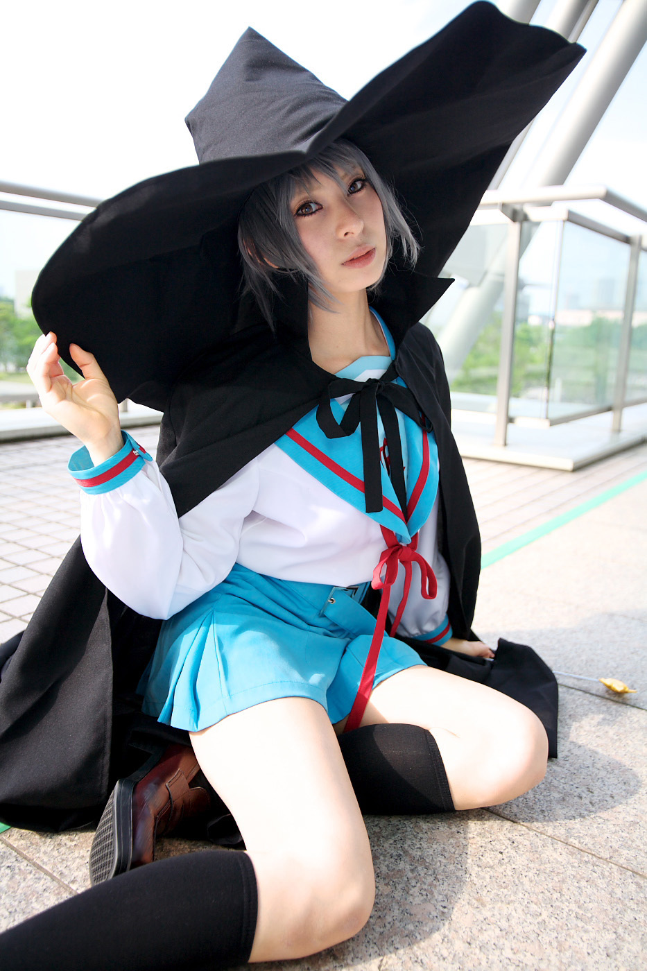 ari (model), nagato yuki, suzumiya haruhi no yuuutsu, highres, photo (medium), cape, cosplay, hat, kneehighs, sailor, school uniform, serafuku, socks, wand, witch hat