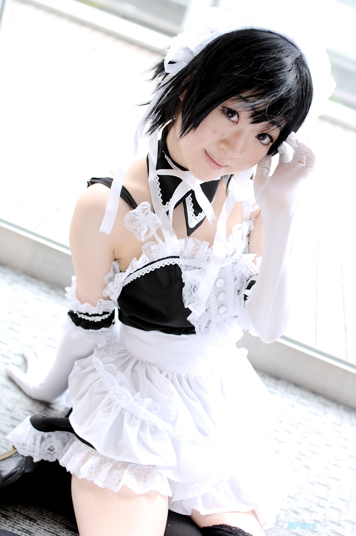 minami riko, sawatari izumi, kore ga watashi no goshujin-sama, photo (medium), 1girl, apron, asian, bare shoulders, black hair, black shoes, black thighhighs, carpet, cosplay, detached collar, dutch angle, elbow gloves, facing viewer, female focus, gloves, indoors, japanese (nationality), looking at viewer, maid, maid apron, maid headdress, nakabayashi yoshitaka's maid uniform, on floor, sawatari izumi (cosplay), shoes, short hair, sitting, solo, thighhighs, waist apron, white apron, white gloves, window, yokozuwari