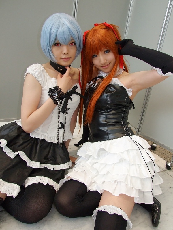 namada, saya (cosplayer), ayanami rei, souryuu asuka langley, neon genesis evangelion, black footwear, black legwear, photo (medium), 2girls, alternate costume, arm support, armpits, asian, ayanami rei (cosplay), bare shoulders, black gloves, black skirt, blue eyes, blue hair, blurry, breasts, bustier, collar, color contacts, cosplay, depth of field, elbow gloves, frilled skirt, frills, gloves, goth fashion, hair ribbon, high heels, indoors, lace, leash, lingerie, long hair, looking at viewer, makeup, mascara, miniskirt, multiple girls, on floor, orange hair, red eyes, ribbon, short hair, sitting, skirt, small breasts, smile, souryuu asuka langley (cosplay), thighhighs, twintails, underwear, white skirt, yokozuwari, zettai ryouiki
