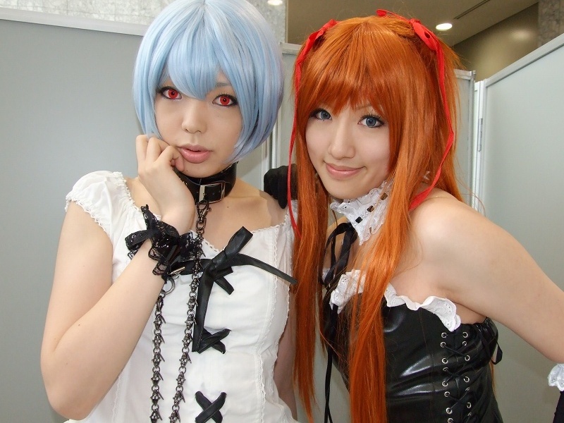 namada, saya (cosplayer), ayanami rei, souryuu asuka langley, neon genesis evangelion, photo (medium), 2girls, alternate costume, asian, ayanami rei (cosplay), bare shoulders, black gloves, blue eyes, blue hair, breasts, bustier, collar, color contacts, cosplay, elbow gloves, frills, gloves, goth fashion, hair ribbon, indoors, lace, leash, lingerie, long hair, looking at viewer, makeup, mascara, multiple girls, orange hair, red eyes, ribbon, short hair, small breasts, smile, souryuu asuka langley (cosplay), standing, twintails, underwear