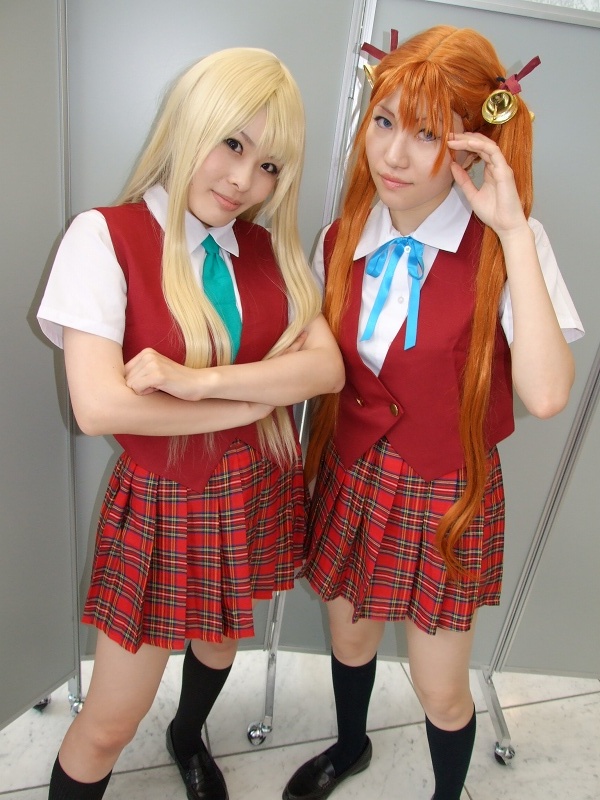 mio (cosplayer), rou (cosplayer), kagurazaka asuna, yukihiro ayaka, mahou sensei negima!, photo (medium), 2girls, bell, blonde hair, cosplay, hair ribbon, kneehighs, multiple girls, ribbon, school uniform, socks, twintails