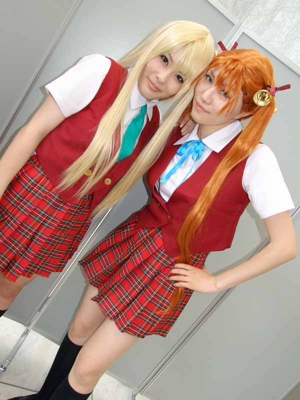 mio (cosplayer), rou (cosplayer), kagurazaka asuna, yukihiro ayaka, mahou sensei negima!, photo (medium), 2girls, bell, blonde hair, cosplay, hair ribbon, kneehighs, multiple girls, ribbon, school uniform, socks, twintails