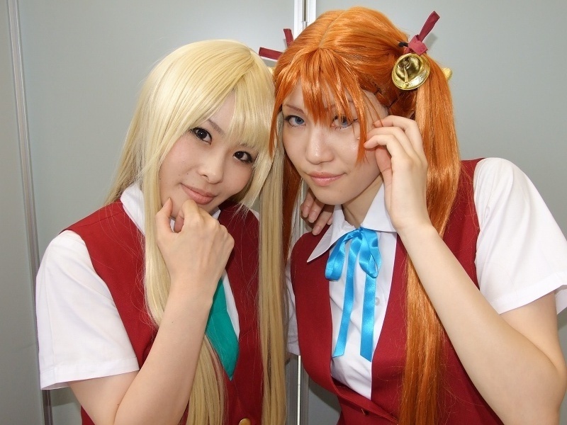 mio (cosplayer), rou (cosplayer), kagurazaka asuna, yukihiro ayaka, mahou sensei negima!, photo (medium), 2girls, bell, blonde hair, cosplay, hair ribbon, kneehighs, multiple girls, ribbon, school uniform, socks, twintails