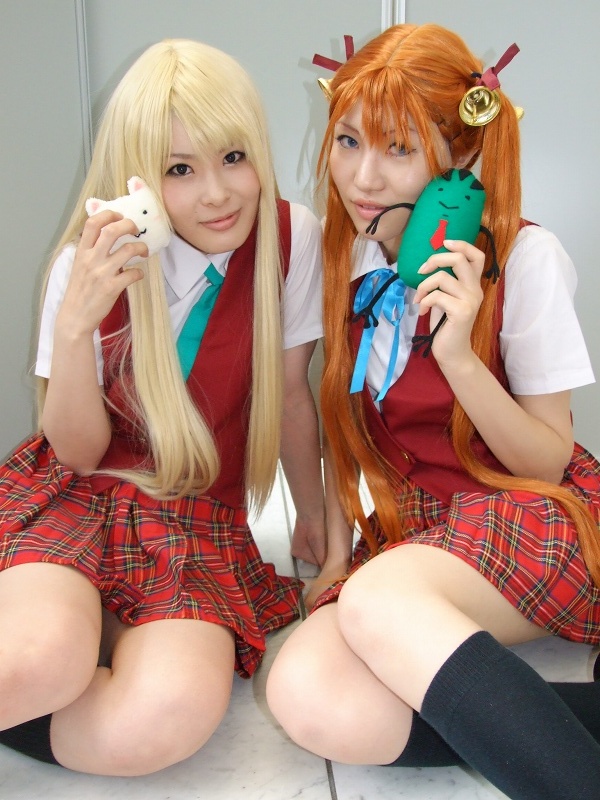 mio (cosplayer), rou (cosplayer), kagurazaka asuna, yukihiro ayaka, mahou sensei negima!, photo (medium), 2girls, bell, blonde hair, cosplay, hair ribbon, kneehighs, multiple girls, ribbon, school uniform, socks, stuffed animal, stuffed toy, twintails