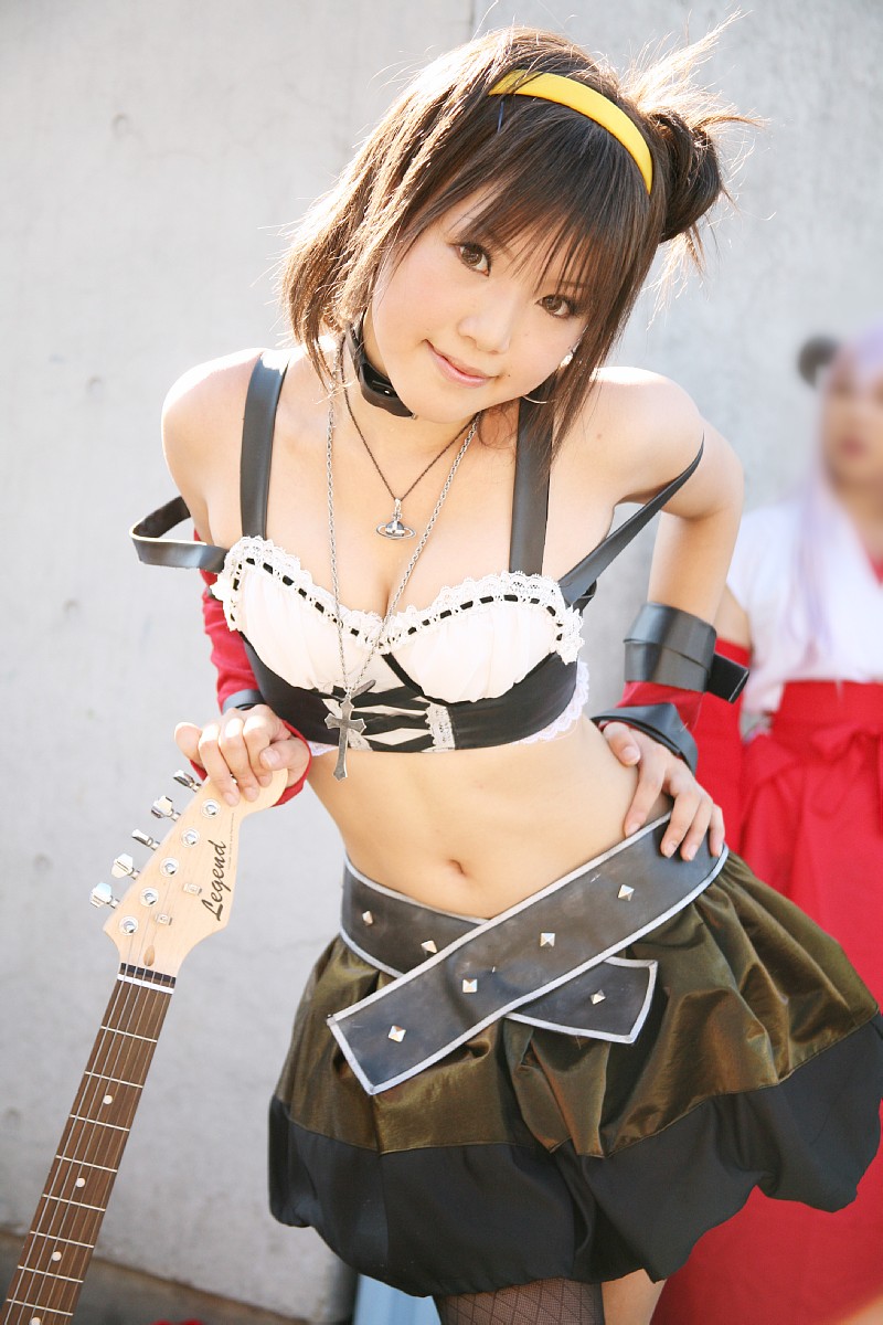 kipi-san, suzumiya haruhi, suzumiya haruhi no yuuutsu, fishnet legwear, highres, photo (medium), 1girl, asian, belt, breasts, cosplay, elbow gloves, female focus, fishnets, gloves, guitar, hairband, instrument, looking at viewer, midriff, outdoors, small breasts, solo, suzumiya haruhi (cosplay)