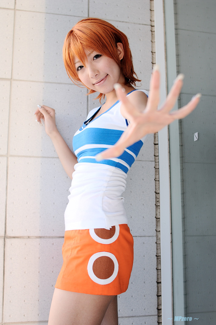 nami (one piece), nami (one piece) (east blue), one piece, real life, photo (medium), 1girl, asian, cosplay, female focus, miniskirt, nami (one piece) (cosplay), orange hair, shiriru, shirt, skirt, solo, striped clothes, striped shirt, t-shirt