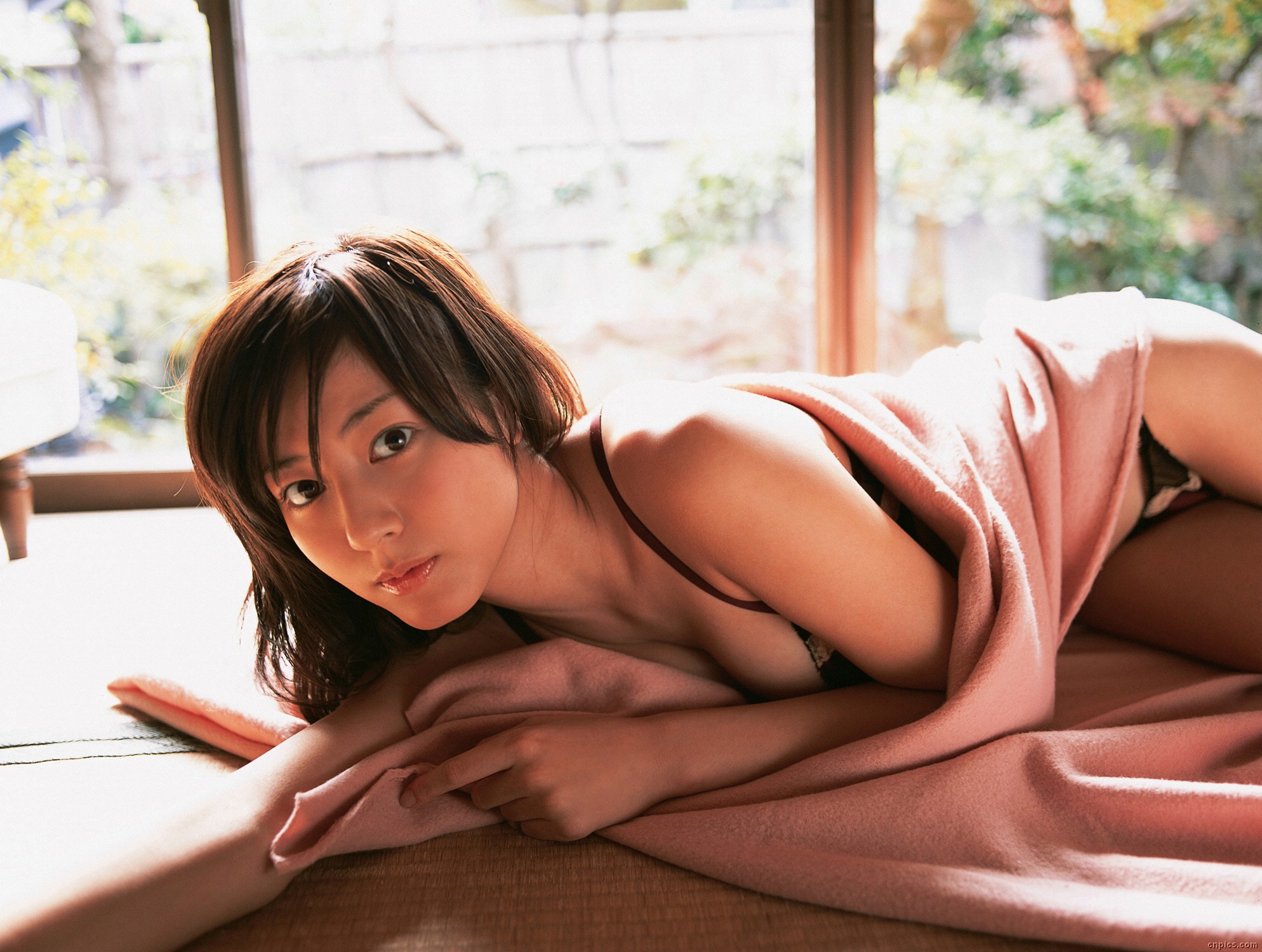 sugimoto yumi, highres, photo (medium), 1girl, asian, bikini, blanket, brown hair, female focus, floor, indoors, long hair, looking at viewer, mole, solo, swimsuit, tatami