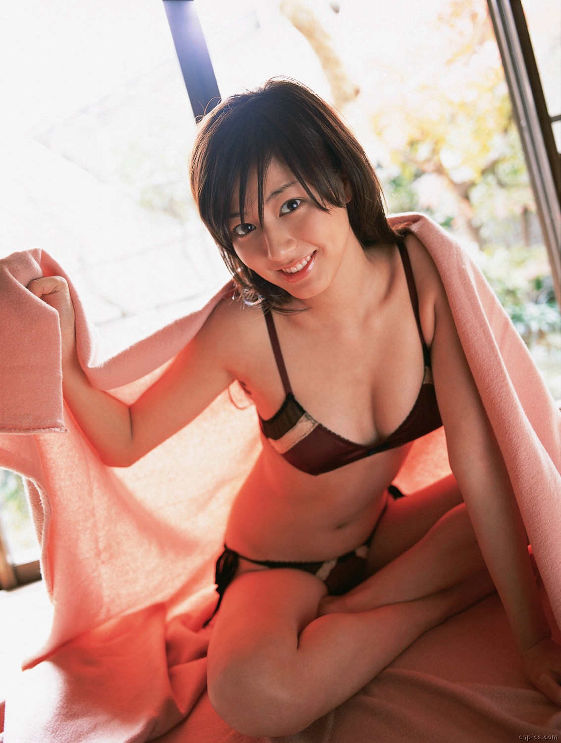 sugimoto yumi, highres, photo (medium), 1girl, asian, bikini, blanket, brown hair, dutch angle, female focus, floor, indoors, long hair, looking at viewer, mole, solo, swimsuit, tatami