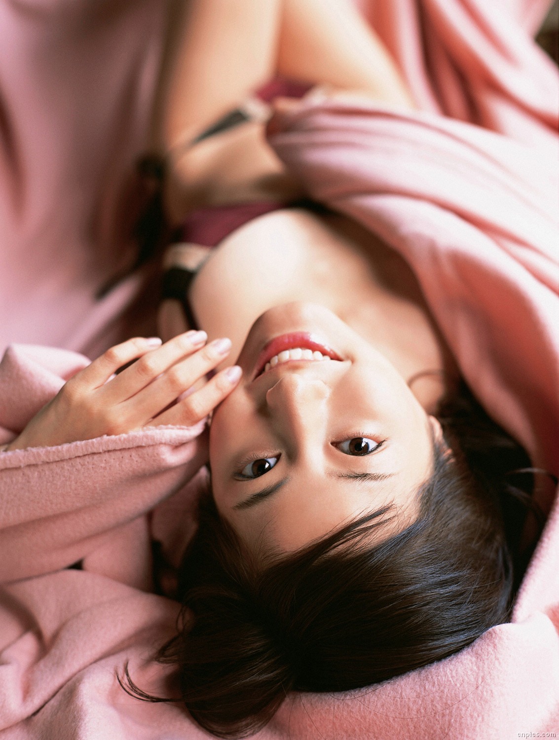 sugimoto yumi, highres, photo (medium), 1girl, asian, bikini, blanket, brown hair, female focus, floor, indoors, long hair, looking at viewer, mole, solo, swimsuit