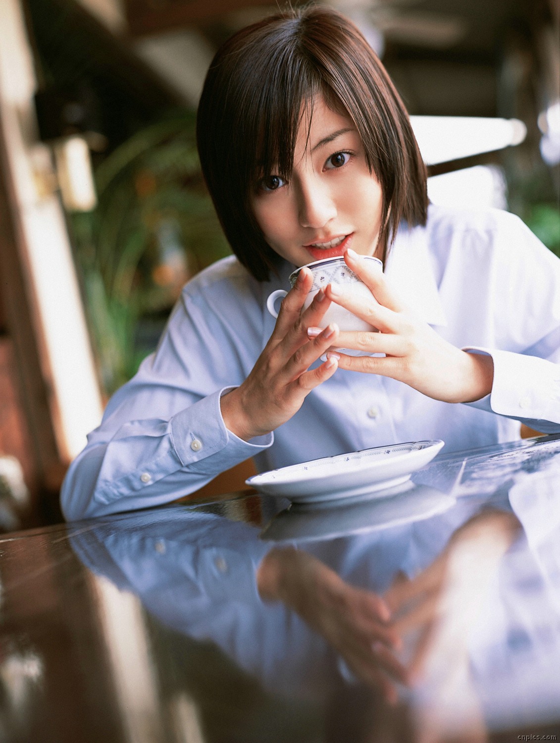 sugimoto yumi, highres, photo (medium), 1girl, asian, brown hair, cosplay, dutch angle, female focus, long hair, looking at viewer, school uniform, solo, tea shop