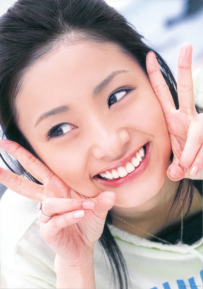 ueto aya, photo (medium), tagme, 1girl, beach, close-up, double v, female focus, smile, solo, teeth, v