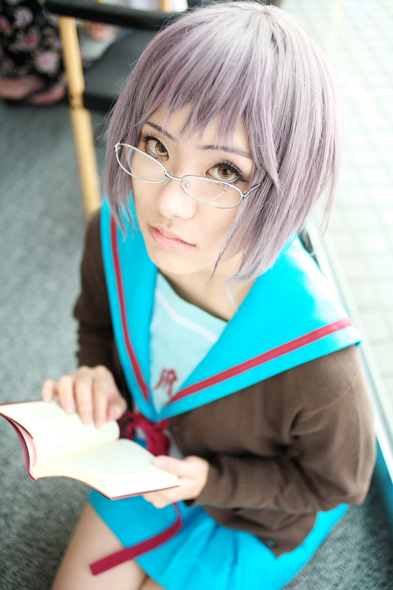 nagato yuki, suzumiya haruhi no yuuutsu, highres, photo (medium), book, cardigan, cosplay, glasses, sailor, school uniform, serafuku, tamaki shuri