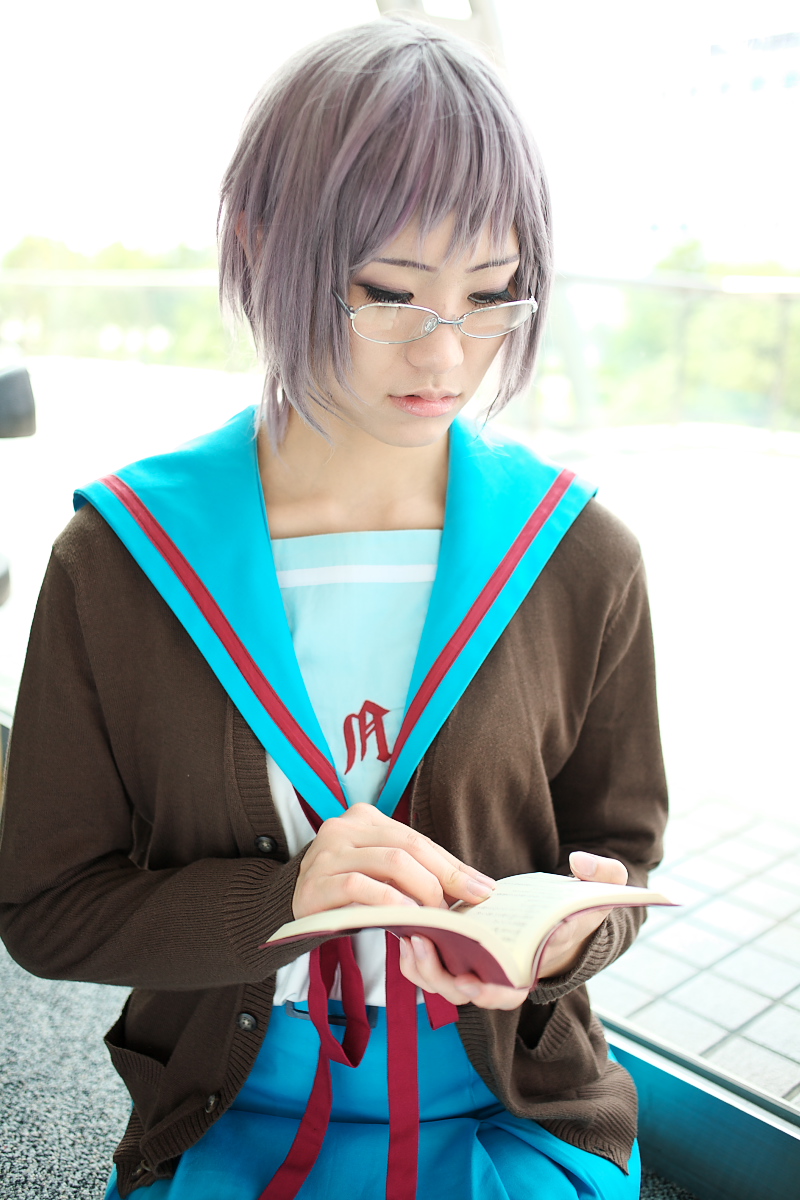 nagato yuki, suzumiya haruhi no yuuutsu, highres, photo (medium), book, cardigan, cosplay, glasses, sailor, school uniform, serafuku, tamaki shuri