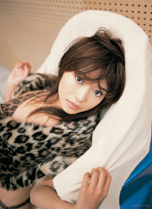 hasebe yu, photo (medium), 1girl, animal print, asian, bikini, brown hair, dutch angle, female focus, indoors, leopard print, leopard skin, looking at viewer, solo, swimsuit