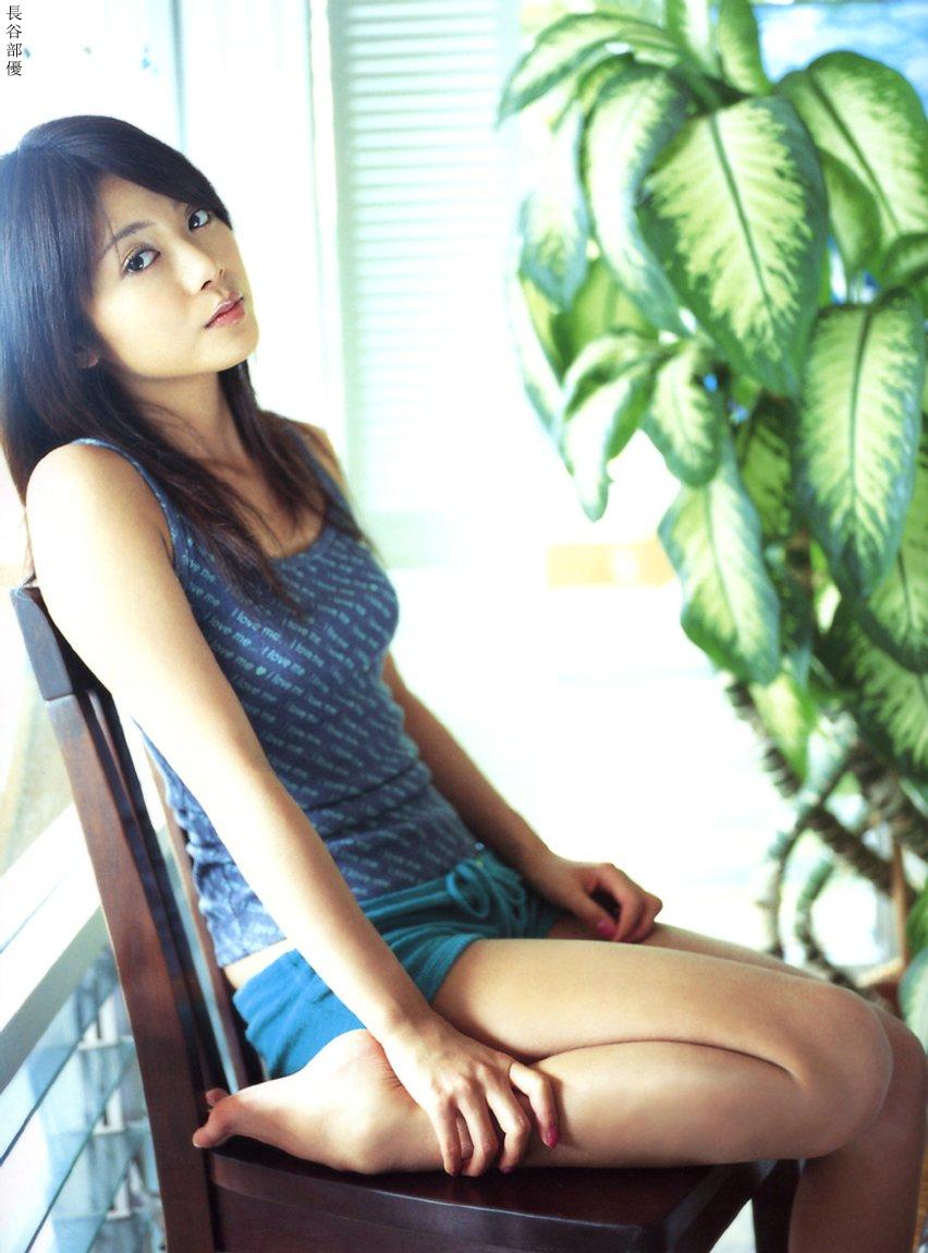 hasebe yu, photo (medium), tagme, 1girl, asian, blurry, breasts, camisole, depth of field, female focus, long hair, looking at viewer, shorts, sitting, small breasts, solo