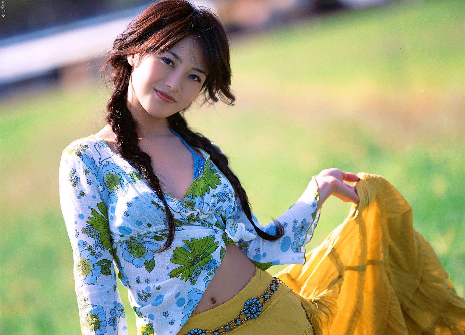 hasebe yu, highres, photo (medium), tagme, 1girl, asian, blurry, bra strap, braid, breasts, brown hair, clothes lift, depth of field, dutch angle, female focus, happy, long hair, looking at viewer, outdoors, skirt, skirt lift, small breasts, smile, solo, twin braids