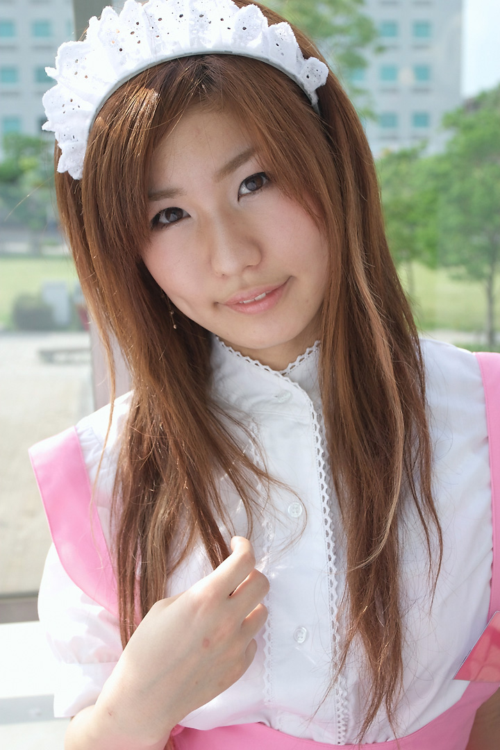 adachi mikki, anna miller, white legwear, photo (medium), 1girl, apron, asian, blurry, brown hair, cosplay, depth of field, dyed hair, female focus, looking at viewer, outdoors, parted lips, solo, tree, waitress, waitress uniform