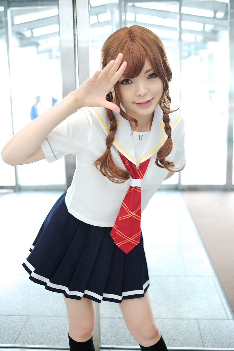 namada, mizusawa mao, kimi kiss, light brown hair, highres, photo (medium), 1girl, asian, blurry, braid, breasts, brown eyes, color contacts, cosplay, depth of field, dyed hair, female focus, glass wall, head tilt, indoors, kneehighs, leaning forward, lips, looking at viewer, makeup, mascara, mizusawa mao (cosplay), neck ribbon, pleated skirt, red ribbon, ribbon, school uniform, serafuku, shirt, short sleeves, skirt, small breasts, smile, socks, solo, standing, taurus symbol, thighhighs, twin braids, waving, white shirt, zettai ryouiki