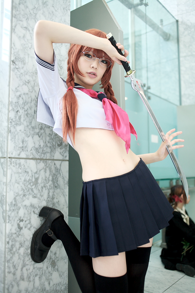 namada, arisugawa shii, the art of yamashita shunya, black footwear, black legwear, highres, photo (medium), 2girls, aqua eyes, arisugawa shii (cosplay), asian, blue eyes, blurry, braid, brown hair, color contacts, contrapposto, cosplay, crop top, depth of field, glasses, green eyes, lensless glasses, long hair, looking at viewer, mary janes, midriff, miniskirt, multiple girls, navel, parted lips, pleated skirt, sailor, school uniform, serafuku, shoes, short sleeves, skirt, solo focus, standing, standing on one leg, sword, thighhighs, twin braids, weapon, zettai ryouiki