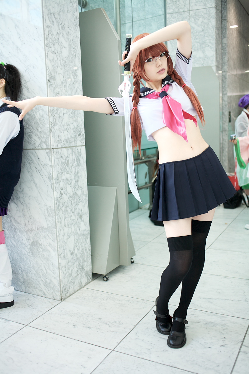 namada, arisugawa shii, the art of yamashita shunya, black footwear, black legwear, highres, photo (medium), 3girls, aqua eyes, arisugawa shii (cosplay), asian, blue eyes, blurry, braid, brown hair, color contacts, contrapposto, cosplay, crop top, depth of field, full body, glasses, green eyes, lensless glasses, long hair, looking at viewer, mary janes, midriff, miniskirt, multiple girls, navel, pleated skirt, sailor, school uniform, serafuku, shoes, short sleeves, skirt, solo focus, standing, sword, thighhighs, twin braids, weapon, zettai ryouiki